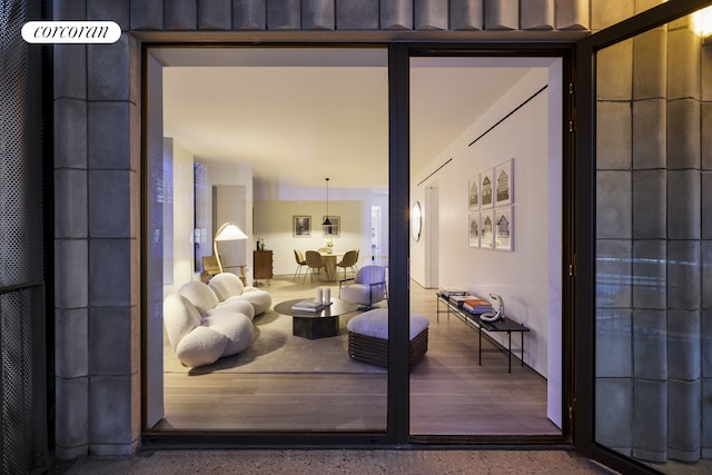 living area featuring speckled floor