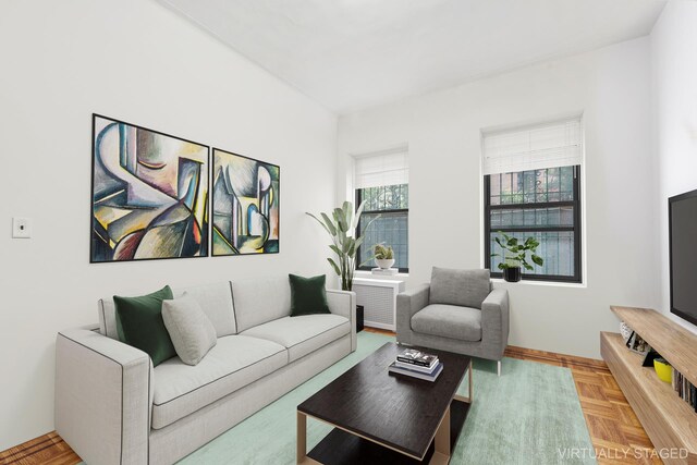 living room with parquet floors