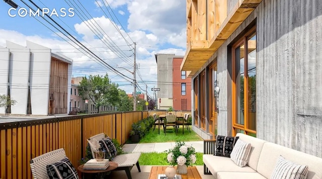 balcony with an outdoor hangout area