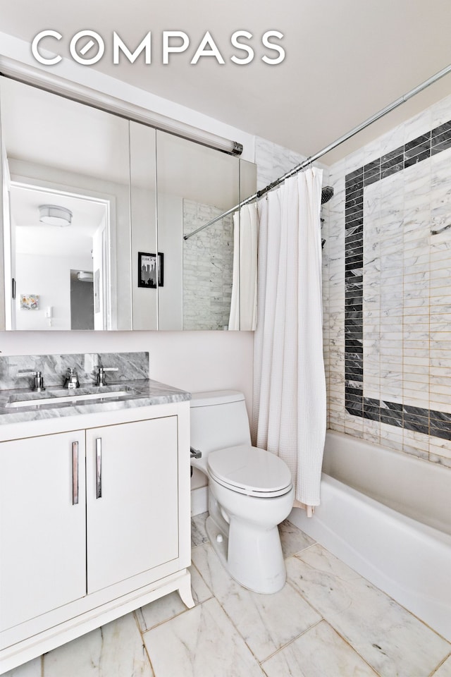 full bathroom featuring toilet, marble finish floor, vanity, and shower / bath combination with curtain