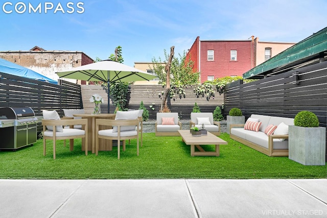 view of yard featuring an outdoor living space and a patio