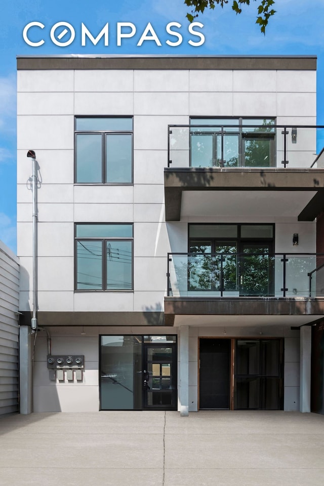 exterior space with driveway and an attached garage