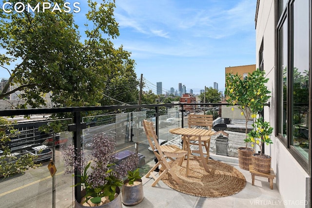 view of patio with a balcony