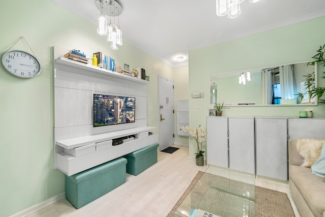 108 W 114th St Unit 4B, New York City, NY 10026 - bathroom with ornamental molding, a chandelier, vanity, wood finished floors, and baseboards