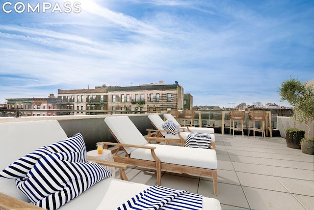 balcony with a patio and an outdoor hangout area