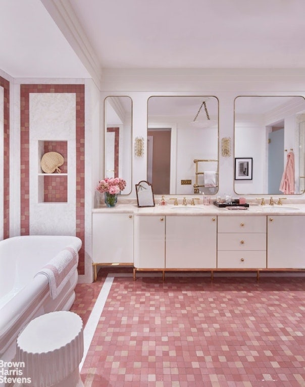 bathroom with vanity and a bathing tub