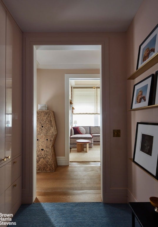 corridor featuring wood-type flooring