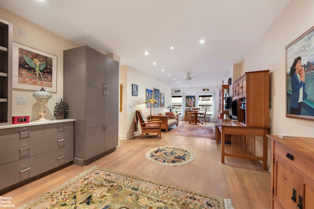 interior space featuring recessed lighting, baseboards, light wood-style floors, and a ceiling fan