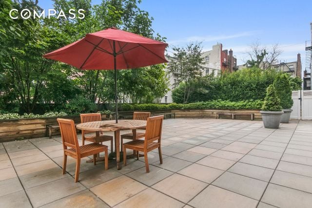 view of patio featuring outdoor dining space