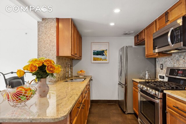 laundry area featuring separate washer and dryer and stacked washer and clothes dryer