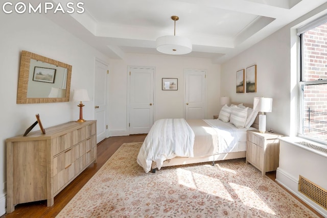 bedroom featuring wood-type flooring