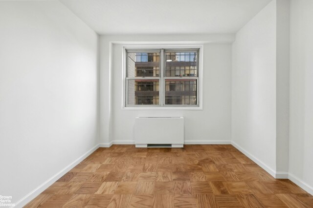 interior space with light parquet floors