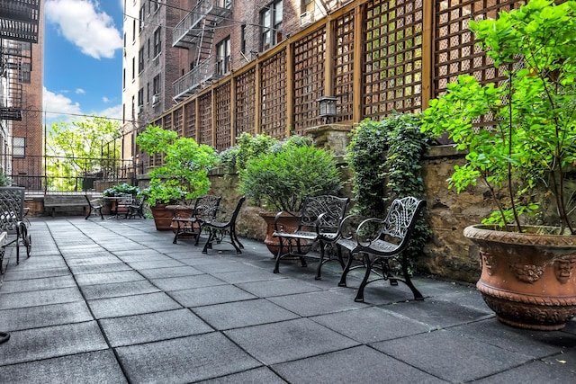 view of patio / terrace with fence