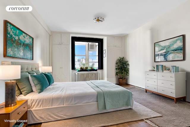 bedroom featuring radiator