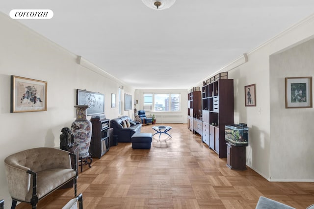 living room featuring light parquet floors and ornamental molding