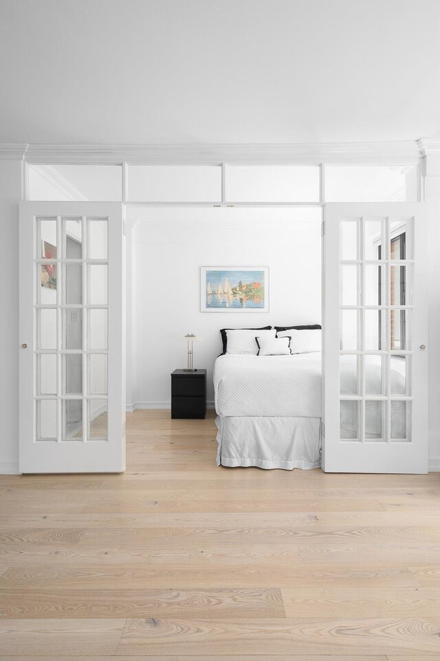 bedroom featuring light wood-type flooring