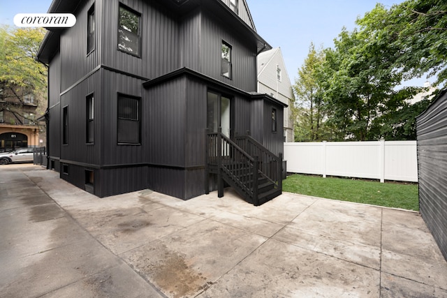 back of house featuring a patio