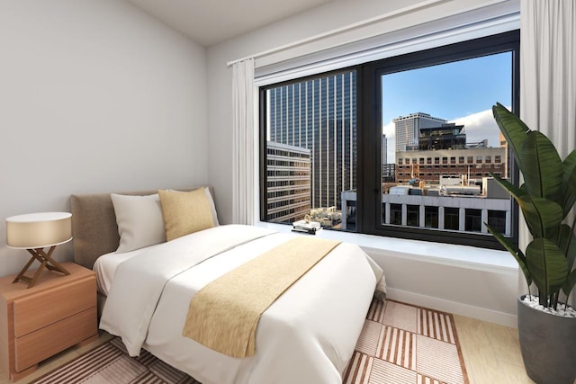 bedroom with light hardwood / wood-style floors