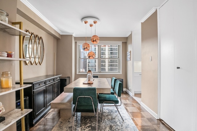 dining area featuring crown molding