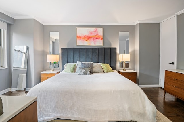 bedroom featuring ornamental molding and baseboards