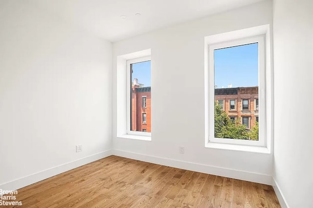406 Greene Ave Unit 3, New York City, NY 11216 - empty room featuring baseboards and light wood finished floors