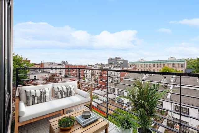 balcony featuring a city view