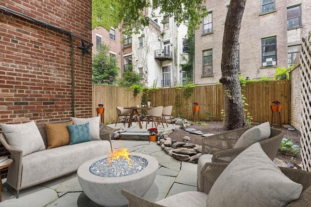 view of patio featuring a fire pit