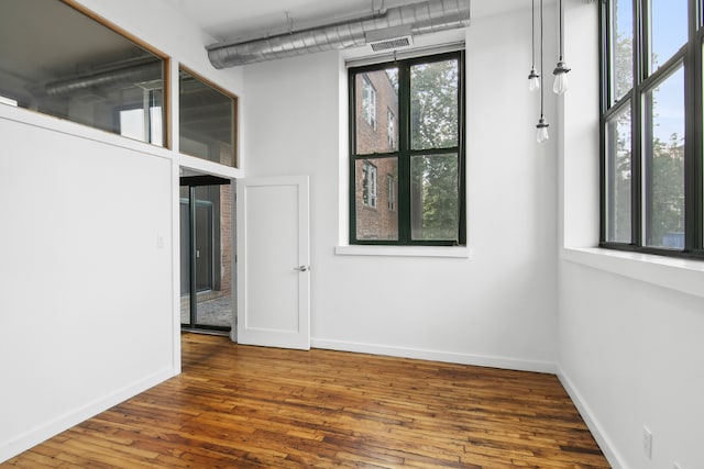 empty room featuring hardwood / wood-style floors