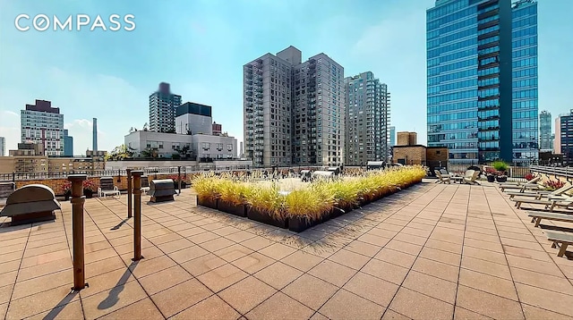 view of patio / terrace with a city view