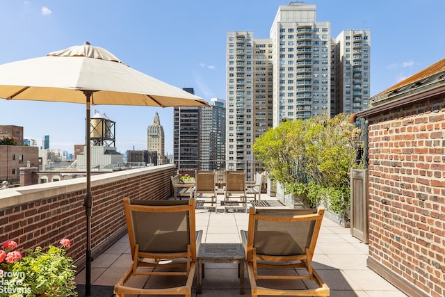 view of patio with a city view