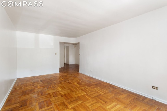 empty room featuring parquet floors