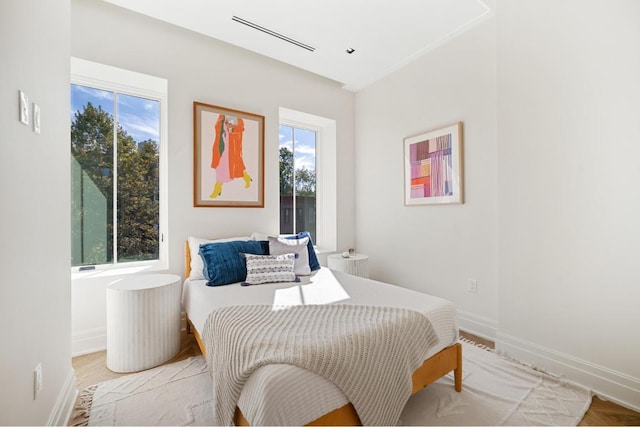 bedroom featuring light hardwood / wood-style flooring