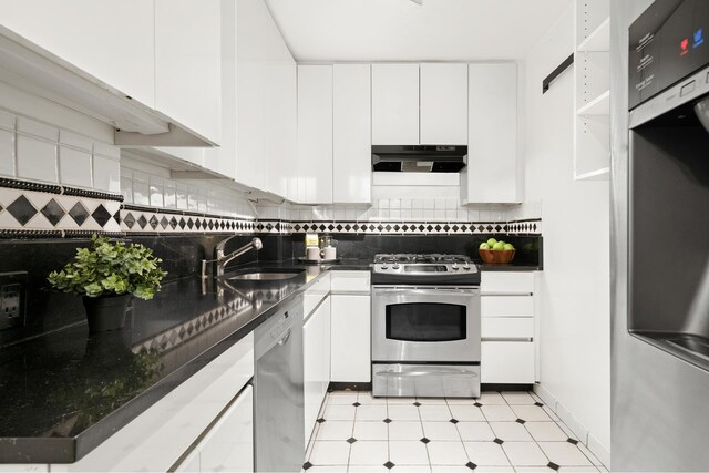 kitchen featuring white cabinetry, sink, and stainless steel appliances