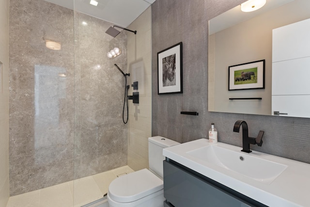 324 W 23rd St Unit 5B, New York City, NY 10011 - full bath with toilet, a tile shower, vanity, and decorative backsplash