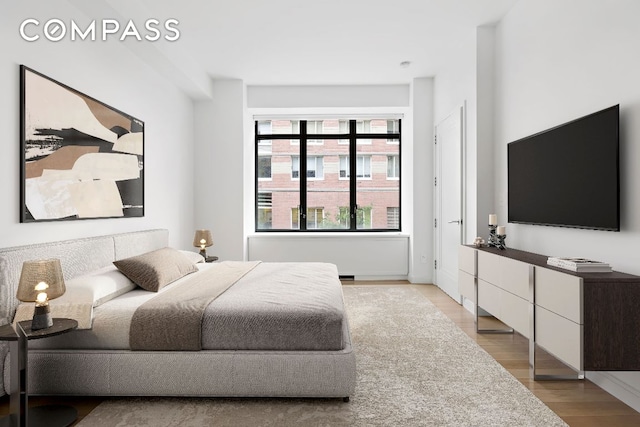 bedroom featuring light hardwood / wood-style flooring