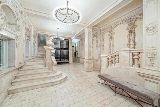 bathroom featuring backsplash, a skylight, vanity, an enclosed shower, and toilet