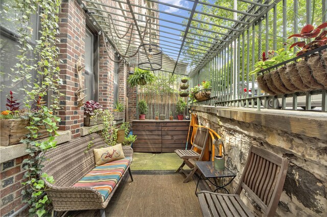 view of patio featuring fence