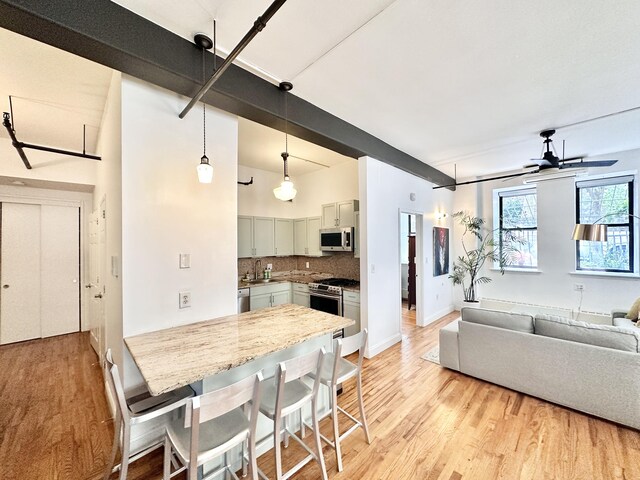 hallway featuring light hardwood / wood-style flooring