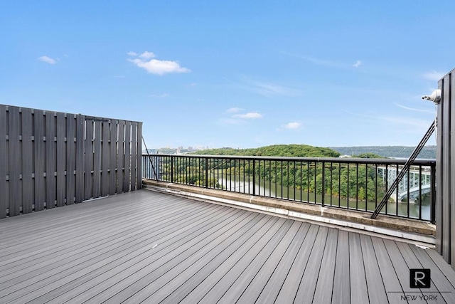 deck featuring a water view