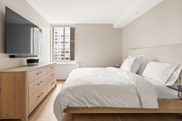 bedroom with light wood-style flooring