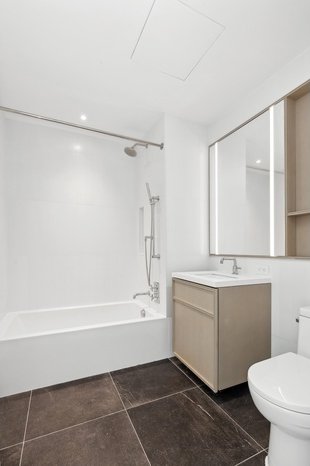 full bathroom with toilet, bathtub / shower combination, and vanity