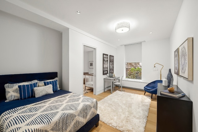 bedroom with light wood-style flooring