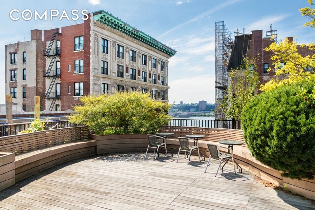 deck featuring a water view