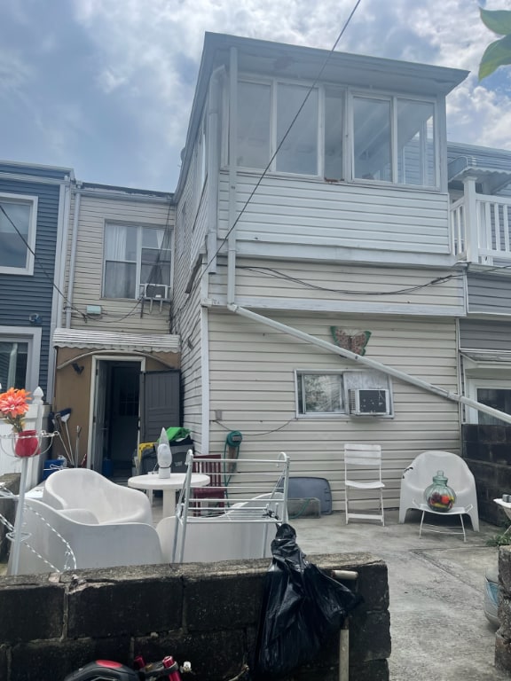 rear view of property with a patio