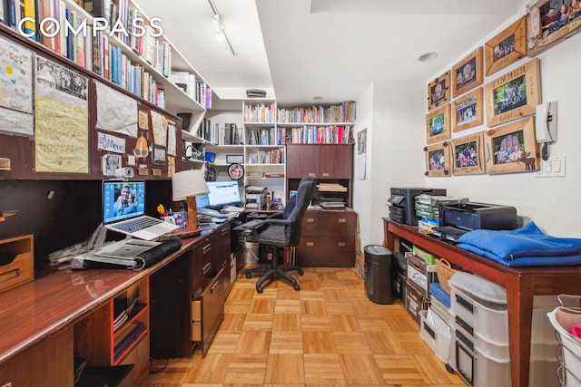 office area with rail lighting