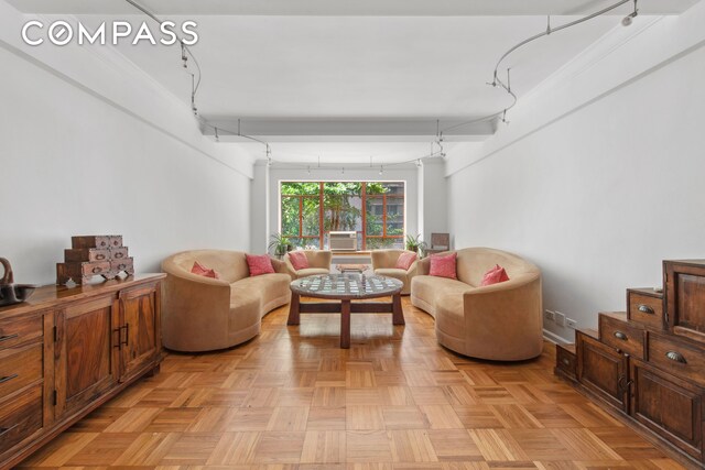 living room featuring track lighting