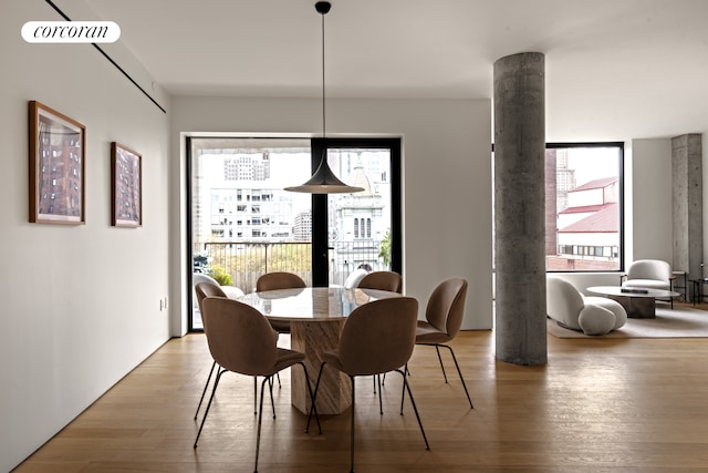 9 Chapel St Unit 8A, New York City, NY 11201 - dining room featuring light wood finished floors, visible vents, and plenty of natural light
