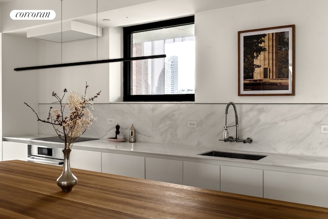 9 Chapel St Unit 8A, New York City, NY 11201 - bathroom with a sink and tasteful backsplash