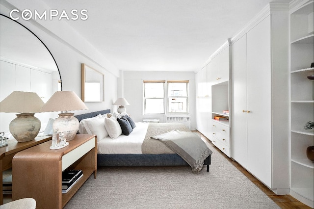 bedroom featuring hardwood / wood-style flooring