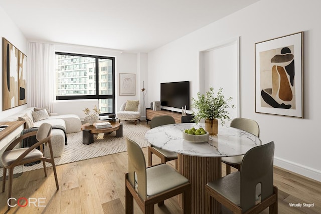 dining room featuring light wood-type flooring